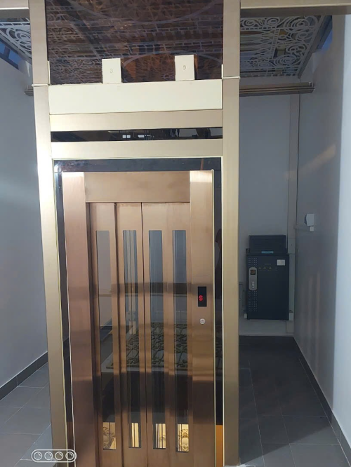 Thang Máy Mở Cửa Tự Động 
