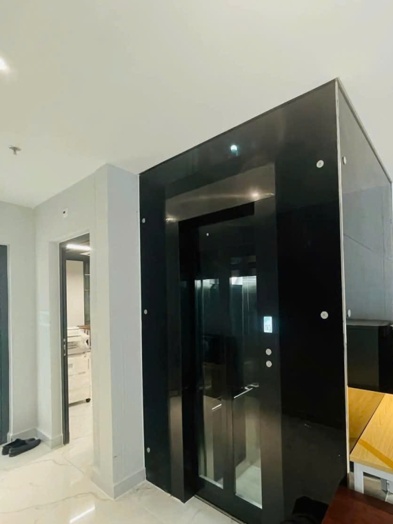 Thang Máy Mở Cửa Tự Động 
