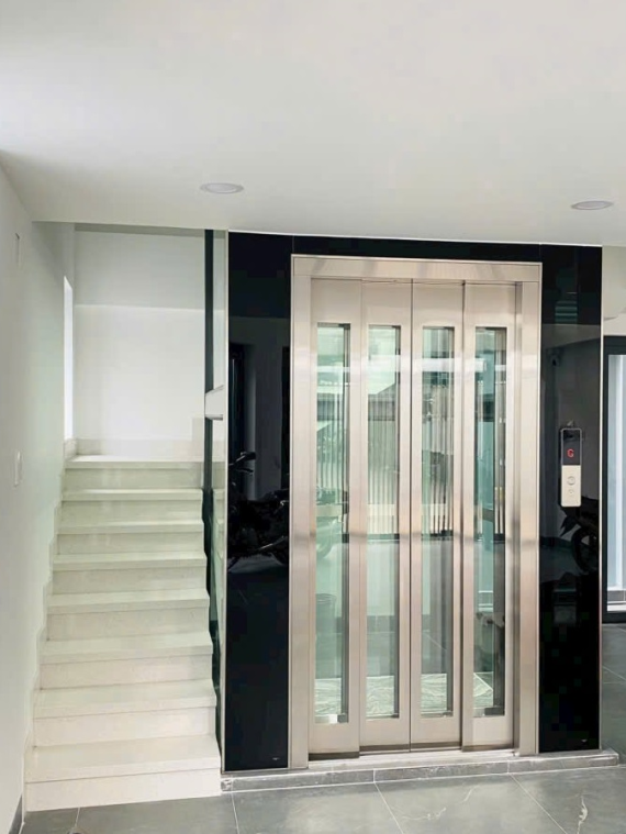 Thang Máy Mở Cửa Tự Động 